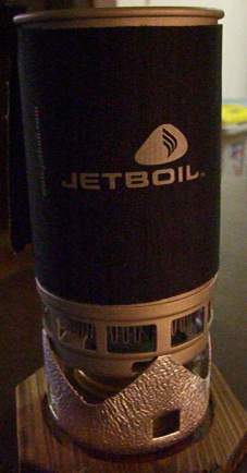 Trangia pot holder with Jetboil cup