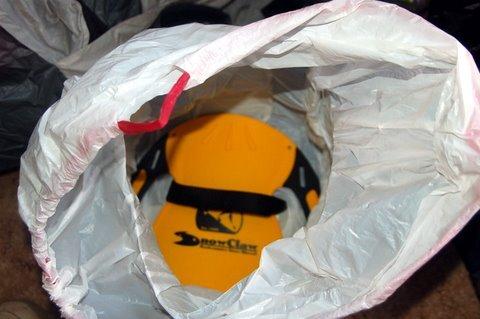 Garbage bag pack and SnowClaw inside