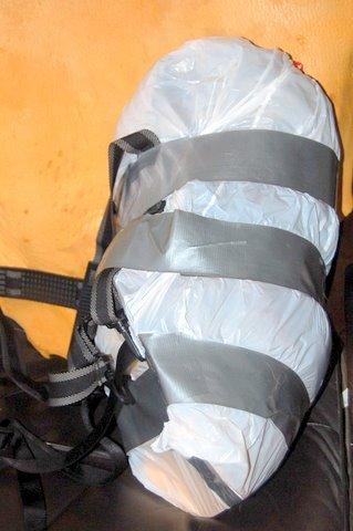 Garbage bag pack full side view