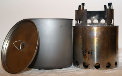 Bushbuddy Ultra Wood Stove Next to a FireLite 1100 Titanium Pot