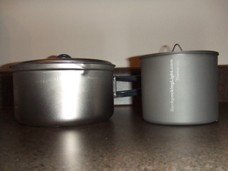 Firelite 550 Titanium Pot next to Evernew 0.9L Titanium Pot