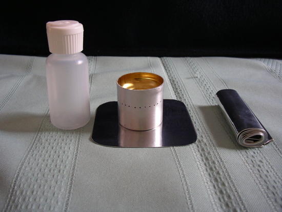 gram weenie, primer pan, windscreen, and 1 ounce fuel bottle