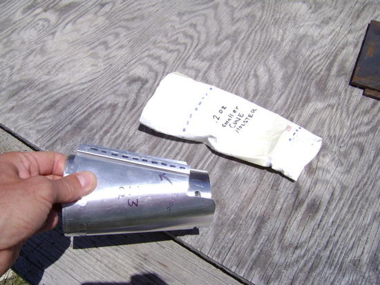 1 - the rolled up cone fit's in the tyvec holder.