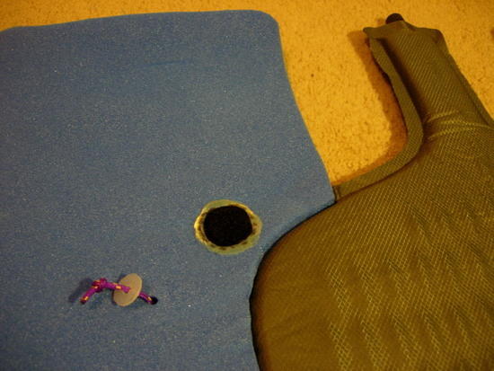Backside detail with pillow attachment backing plate and winter pad velcro patch