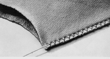 Sewing the elastic under a zigzag