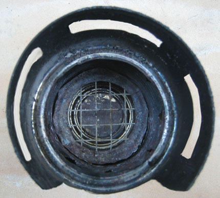 A look within, showing hardware cloth after many hot fires.