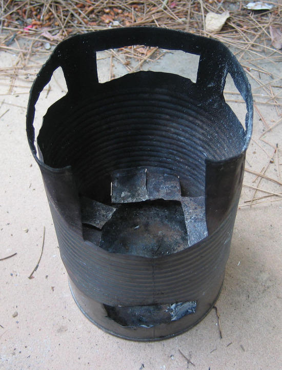 Loosely put in tinder, kindling, wood, and light from below.