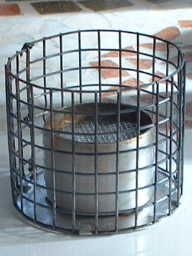 Burner in 1/4 in mesh pot holder