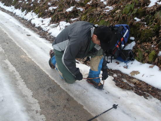 Putting on crampons...again.