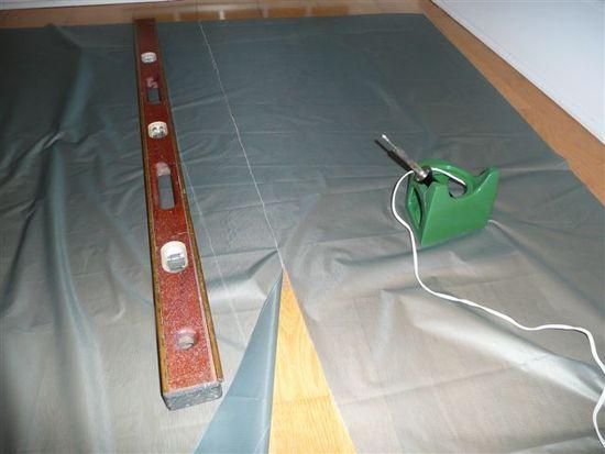 cutting the material using a soldering iron-tip cut with a chisel tip