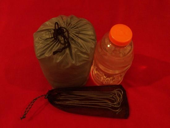 Overhead front view of SUL tarp in stuff sack