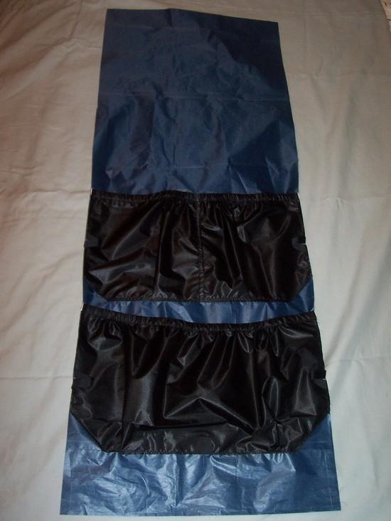 Back panel with pockets prior to stitching together