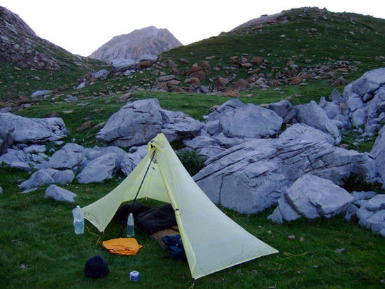 Camp with Bisaurin behind, sunset.