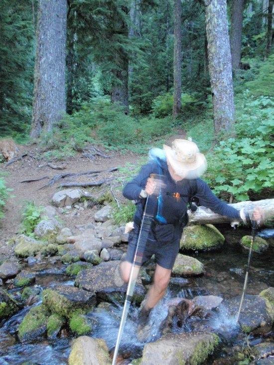 Ed got a shot of me going down on the first creek crossing of the last day August 19th.