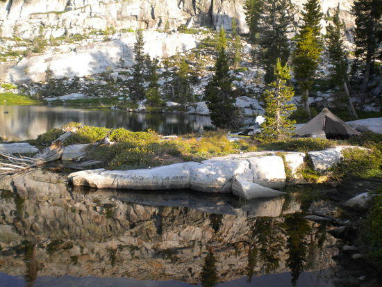 My solo campsite on Sportsman Lake. . .using the Gatewood Cape as a shelter & rain gear.