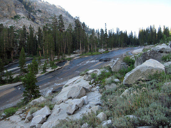 Black Granite & Thin Sheets of Water Rippling Over