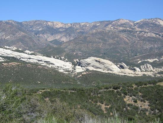 View of large rock formation from the road into the trail head