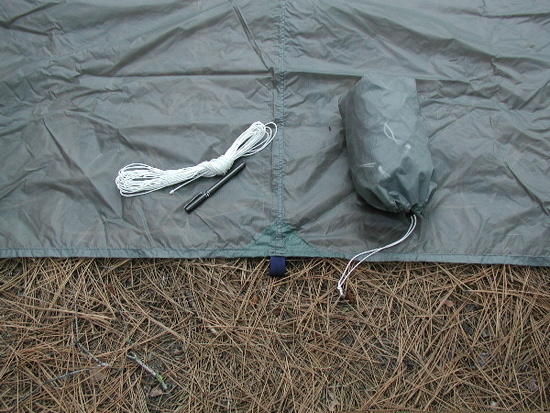 tarp, stuffsack and cord