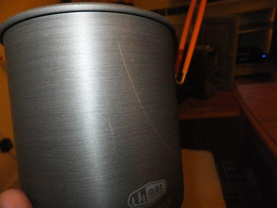 Close up of scratch on pot.