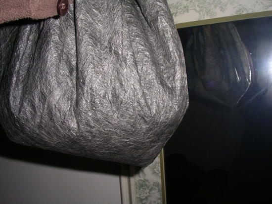 Cuben fiber holding water after 100 compression cycles and  as a doormat on the AT for 2,180 miles