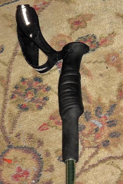 Grip augmented with ice scraper parts