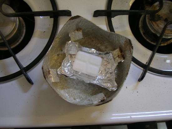 Esbit in tin foil cup inside Trangia windscreen