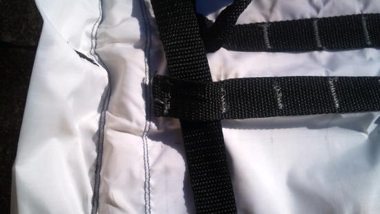 A close-up of a lashing strap passing through the PALS array.