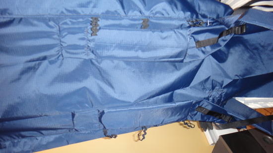 Backpanel showing compression straps and shoulder straps