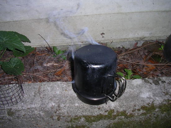 Stove snuffs out nicely leaving surprisingly little residue inside pot.