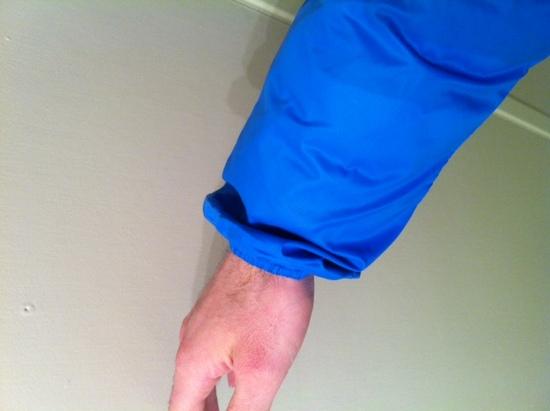 EB Sirocco layered over Downlight sweater on arm