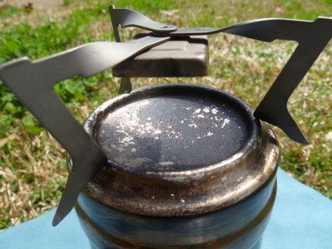 Side shot of stove fit on cook pot