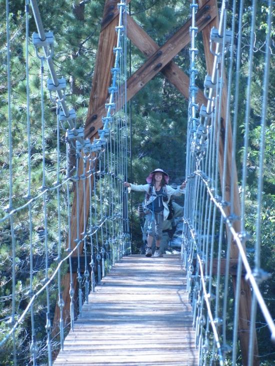 Natalie crossing hanging bridge