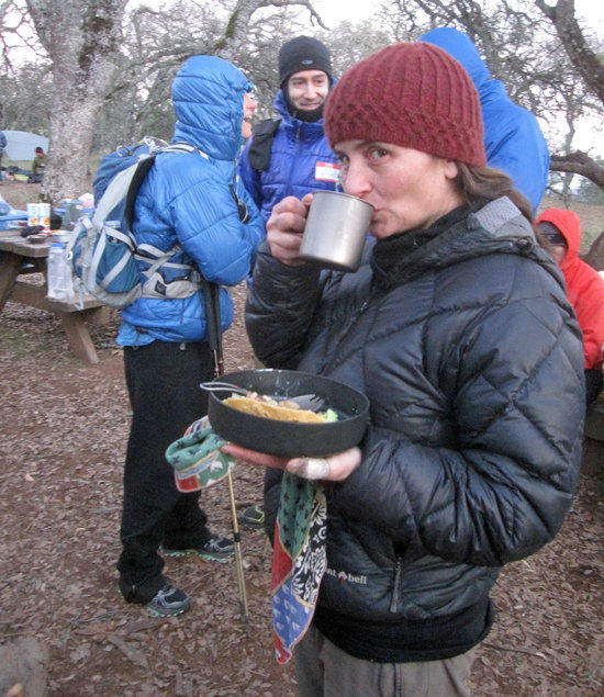 Kat Enjoying a Meal Before the Wood Stove Burn Off