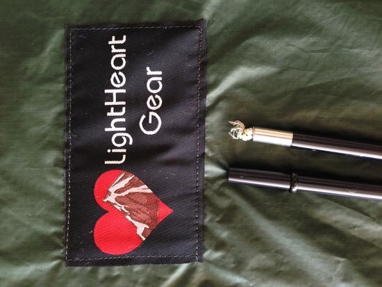 tent poles, one with missing "top"
