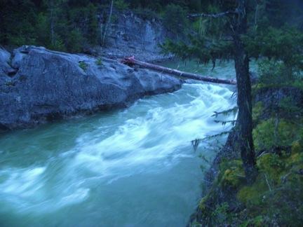 iDan&rsquo;s swimming hole with a log jammed across the entrance./i