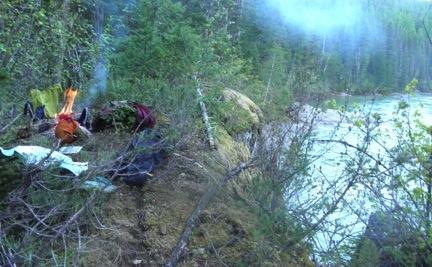 iCamping spot above the river while drying out clothes./i