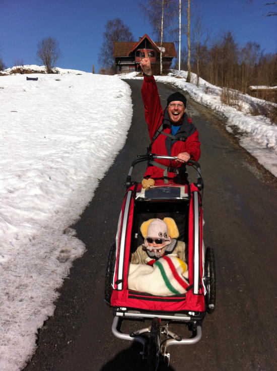 On a forest road, late winter, with the toddler in our Nordic Cab.