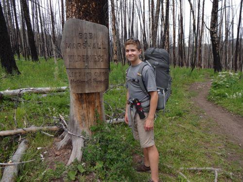 Kaleb at the Bob sign