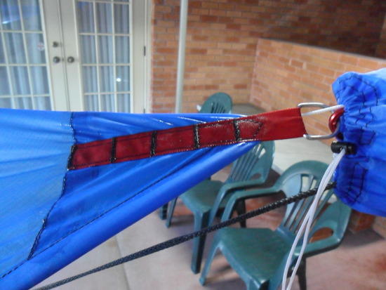 Seam sealed end of tarp
