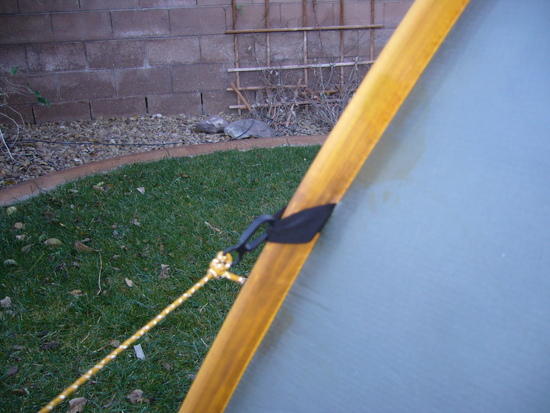 X-ing pole exint thru Velcro closure at end of Moment (SW)