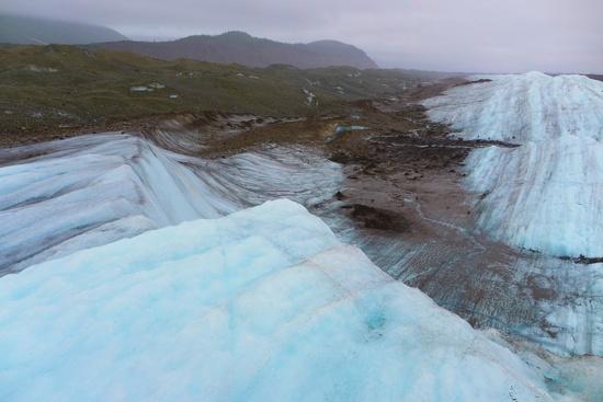 1120330