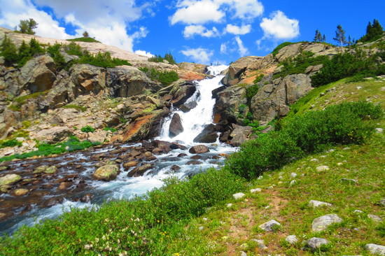 Island lake waterfall